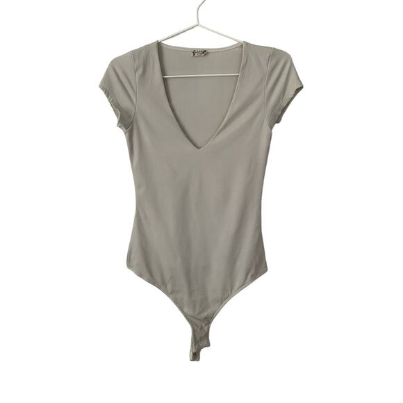 Free People Ready or Not Ivory Ribbed Bodysuit size Small - Picture 1 of 10